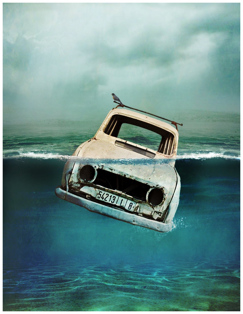 car sinking in water